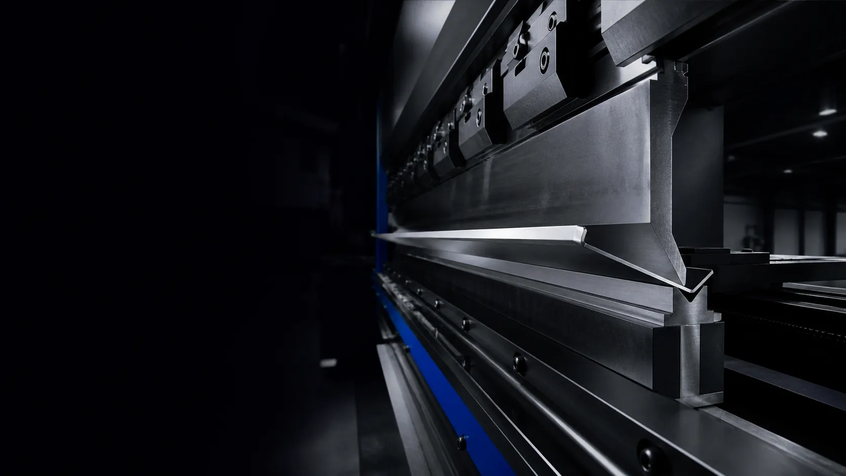 Illustrative close-up of sheet-metal bending tooling